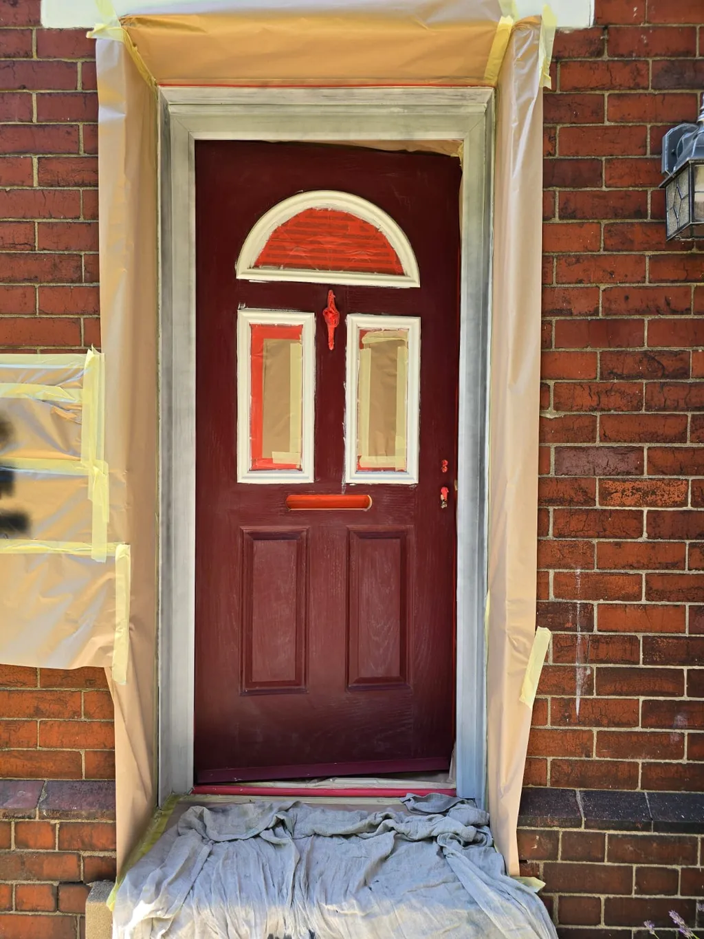 Badly faded Red composite door
